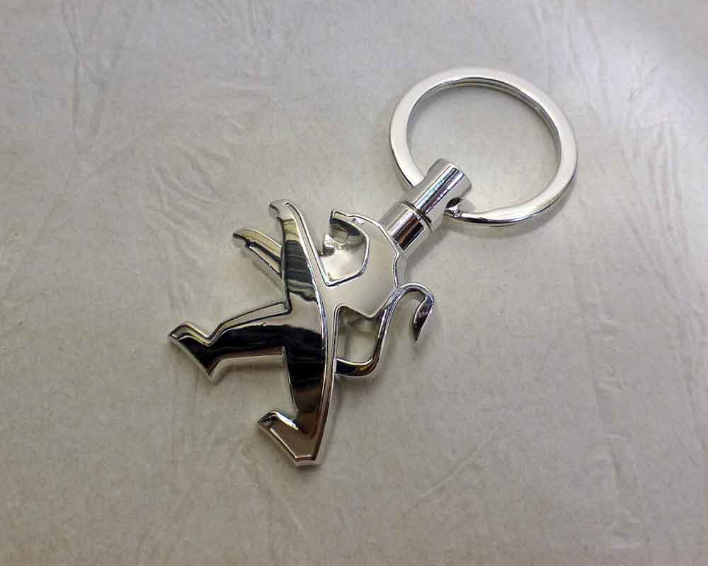 Schlüsselanhänger Peugeot-Löwe silbern